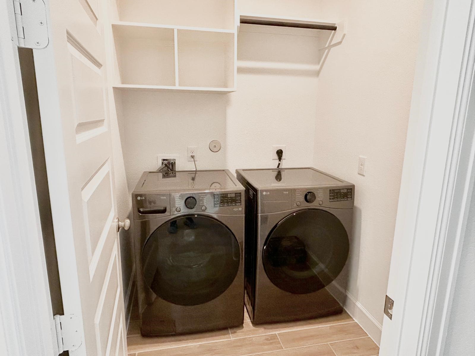 211 Sierra Strm Lane Conroe, TX 77304 - Photo 15 of 25 a utility room with sink dryer and washer