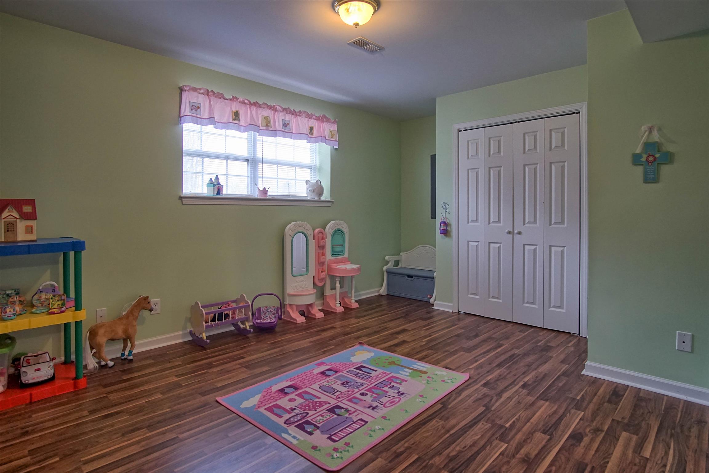 5194 William Woodard Road Springfield, TN 37172 - Photo 15 of 23 a living room with furniture and a wooden floor