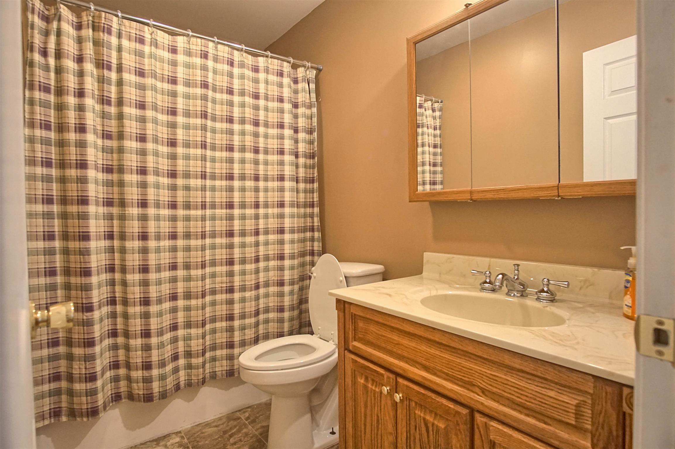 5194 William Woodard Road Springfield, TN 37172 - Photo 17 of 23 a bathroom with a sink a toilet and shower