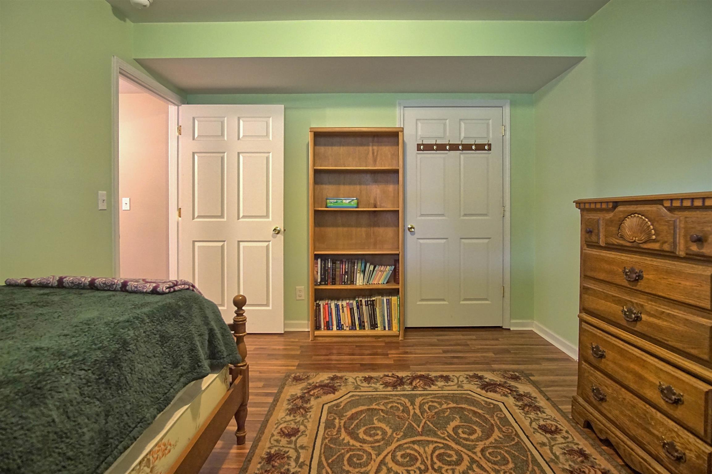 5194 William Woodard Road Springfield, TN 37172 - Photo 18 of 23 a bedroom with a bed and a cabinets