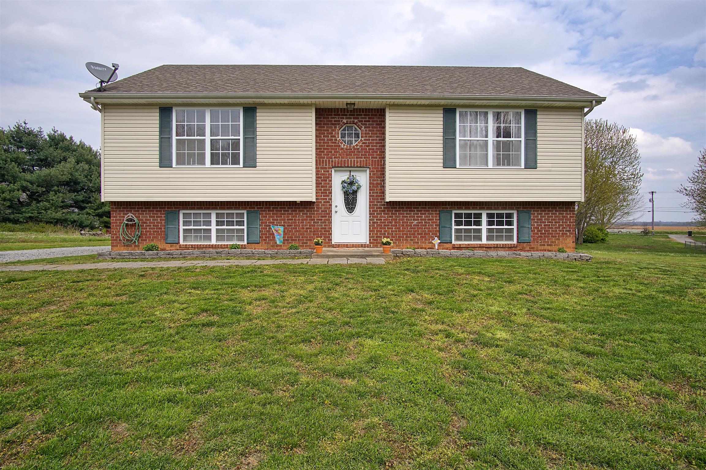 5194 William Woodard Road Springfield, TN 37172 - Photo 3 of 23 a front view of a house with garden
