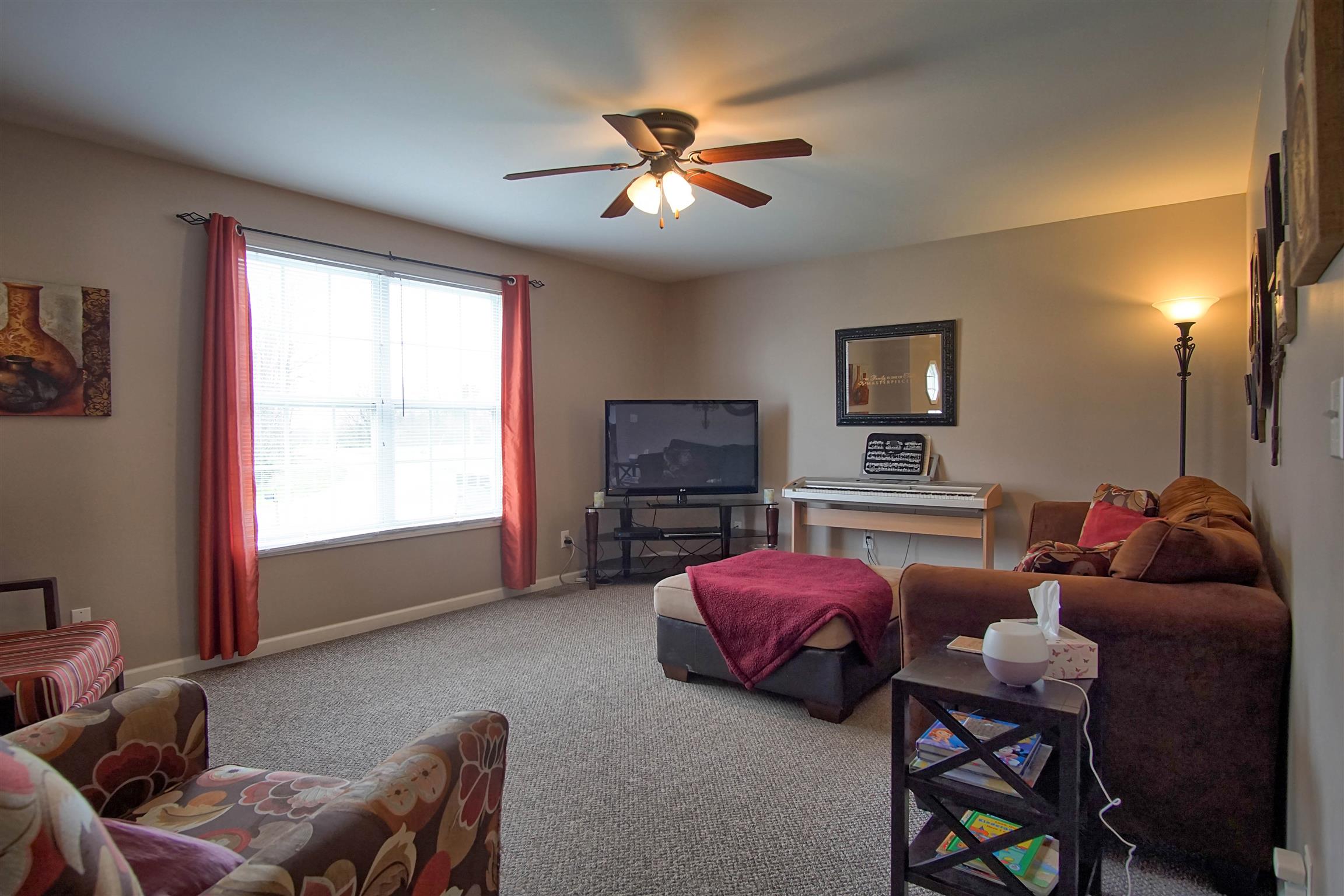 5194 William Woodard Road Springfield, TN 37172 - Photo 6 of 23 a bedroom with a bed and a couch
