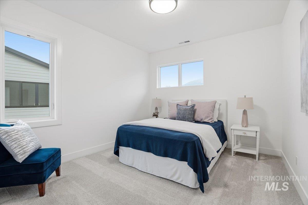 11717 North Rabbitbrush Way Boise, ID 83714 - Photo 30 of 33 Bedroom with light carpet