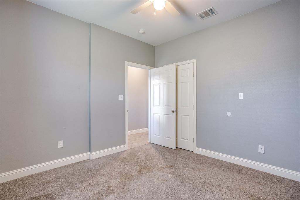 3901 Baylor Street Fort Worth, TX 76119 - Photo 35 of 40 an empty room with a bathroom