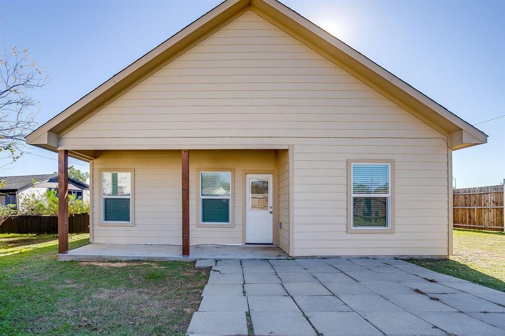 3901 Baylor Street Fort Worth, TX 76119 - Photo 40 of 40 a view of a house with a yard