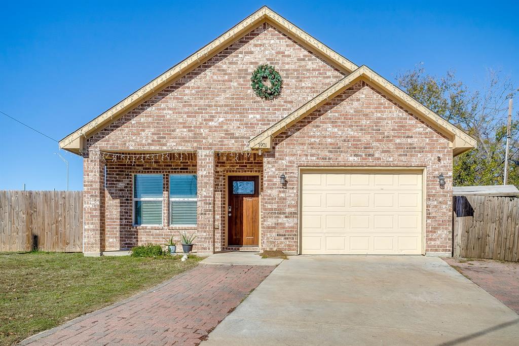 3901 Baylor Street Fort Worth, TX 76119 - Photo 4 of 40 a view of a house with a backyard