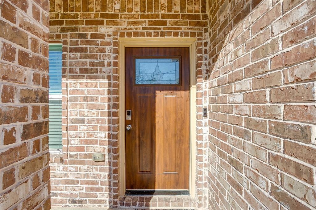 3901 Baylor Street Fort Worth, TX 76119 - Photo 7 of 40 a front view of a house with a window