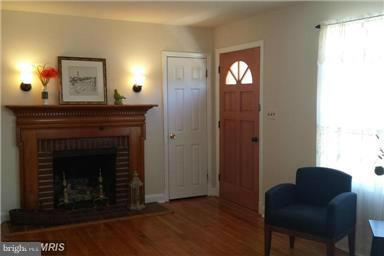 5601 Ranelagh Road White Marsh, MD 21162 - Photo 2 of 12 a living room with furniture and a fireplace