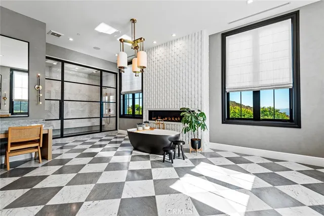 a view of house with porch and outdoor seating