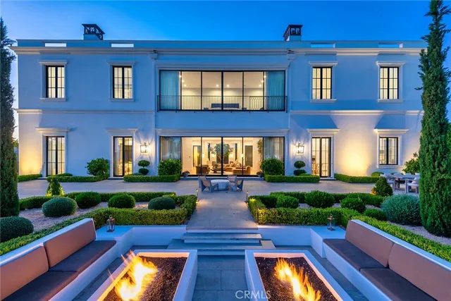 an aerial view of a house with a garden