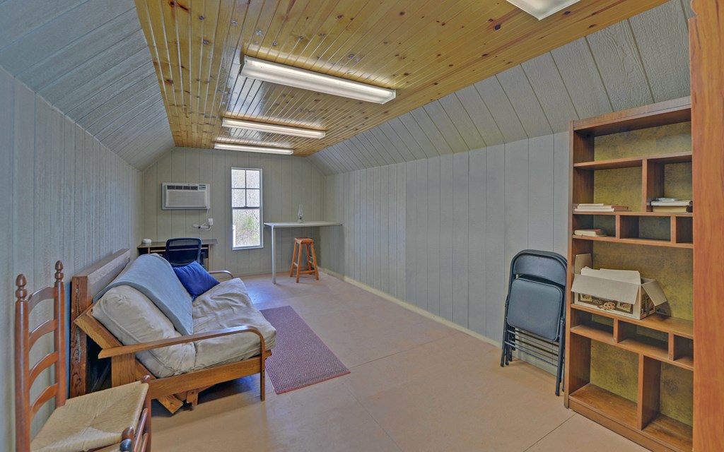 202 Dove Lane Morganton, GA 30560 - Photo 50 of 99 a living room with furniture and a window