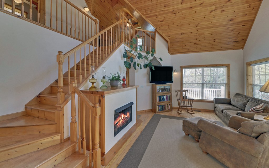 202 Dove Lane Morganton, GA 30560 - Photo 5 of 99 a living room with furniture and a fireplace