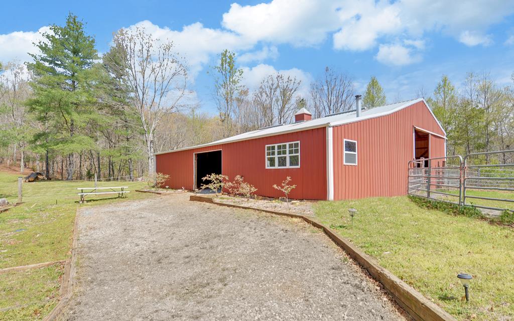 202 Dove Lane Morganton, GA 30560 - Photo 60 of 99 a view of a house with backyard and trees