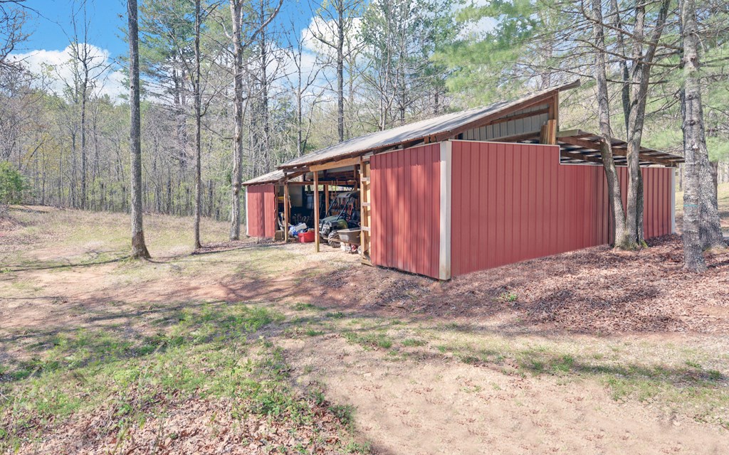 202 Dove Lane Morganton, GA 30560 - Photo 70 of 99 a view of a barn in the backyard of house