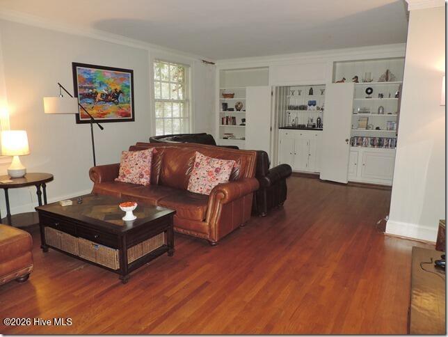 131 Ripley Road Northwest Wilson, NC 27893 - Photo 9 of 53 8 Living Room _ Wet Bar _ Built-Ins