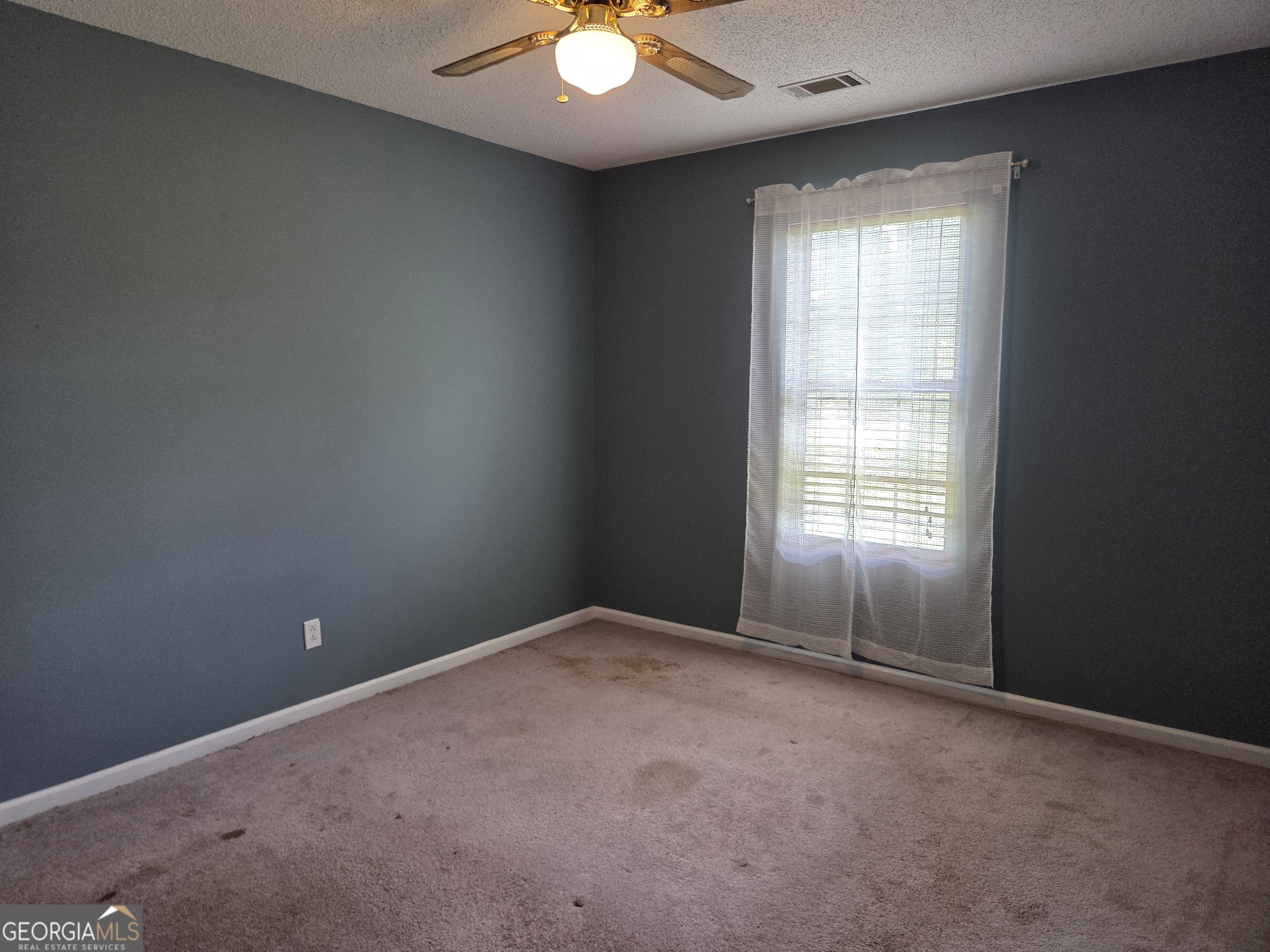 9546 Union Road Metter, GA 30439 - Photo 26 of 45 an empty room with a window