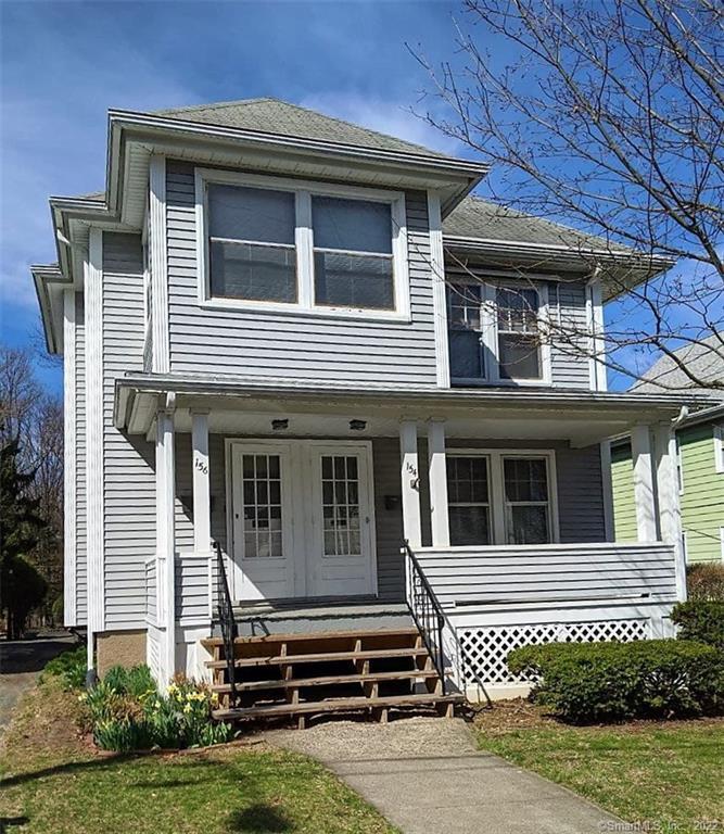 Nice looking Two Family! Enclosed front porch on second floor.