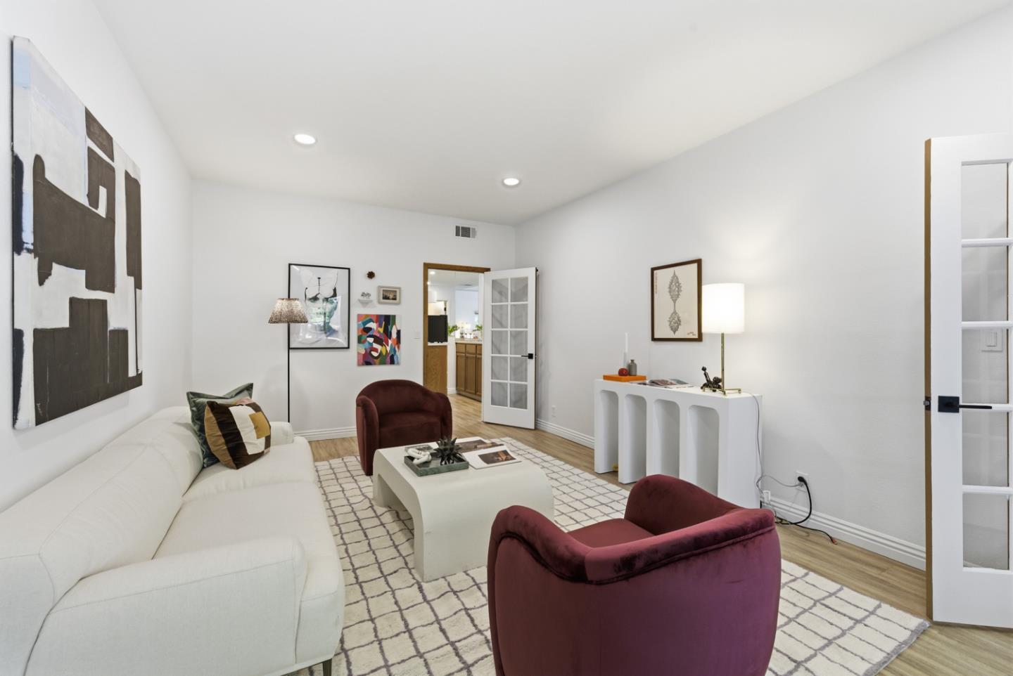 1669 Geary Road Walnut Creek, CA 94597 - Photo 13 of 39 a living room with furniture and a wooden floor