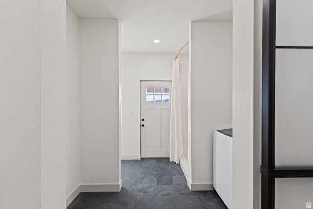 2920 West Temple Cyn Road Laketown, UT 84038 - Photo 45 of 69 Large laundry room with attached hobby space.