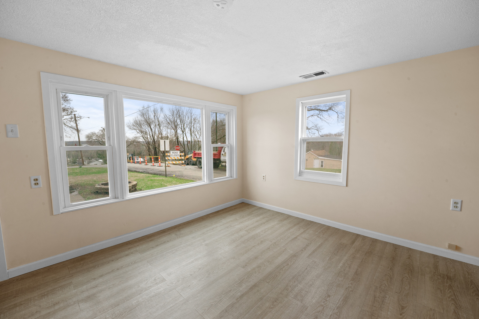 730 5th Street Buffalo, IA 52728 - Photo 2 of 16 a view of an empty room with a window