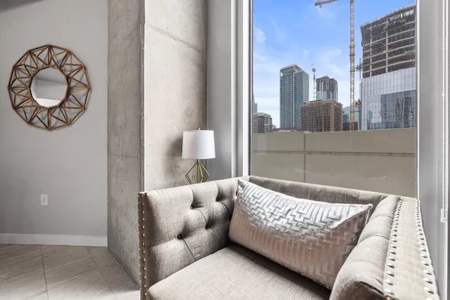 a bedroom with a bed and bathroom