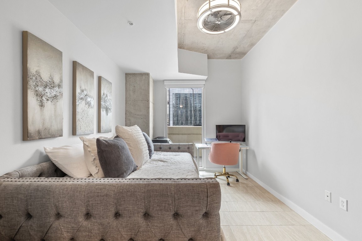 360 Nueces Street, Unit 911 Austin, TX 78701 - Photo 17 of 31 a living room with furniture