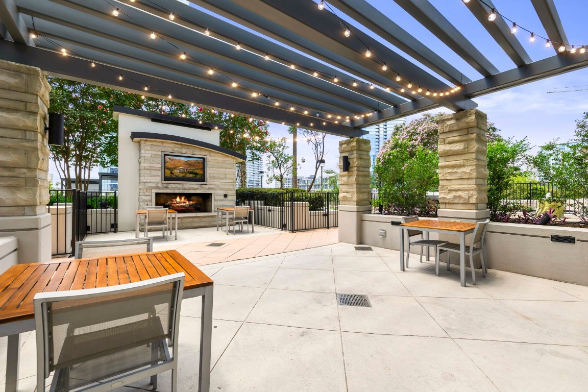 360 Nueces Street, Unit 911 Austin, TX 78701 - Photo 22 of 31 a view of a swimming pool with seating area