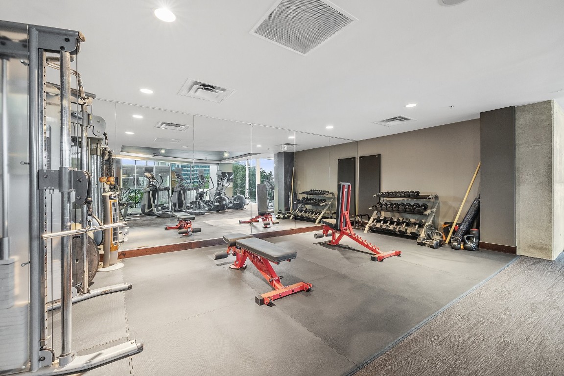 360 Nueces Street, Unit 911 Austin, TX 78701 - Photo 25 of 31 a view of a room with gym equipment