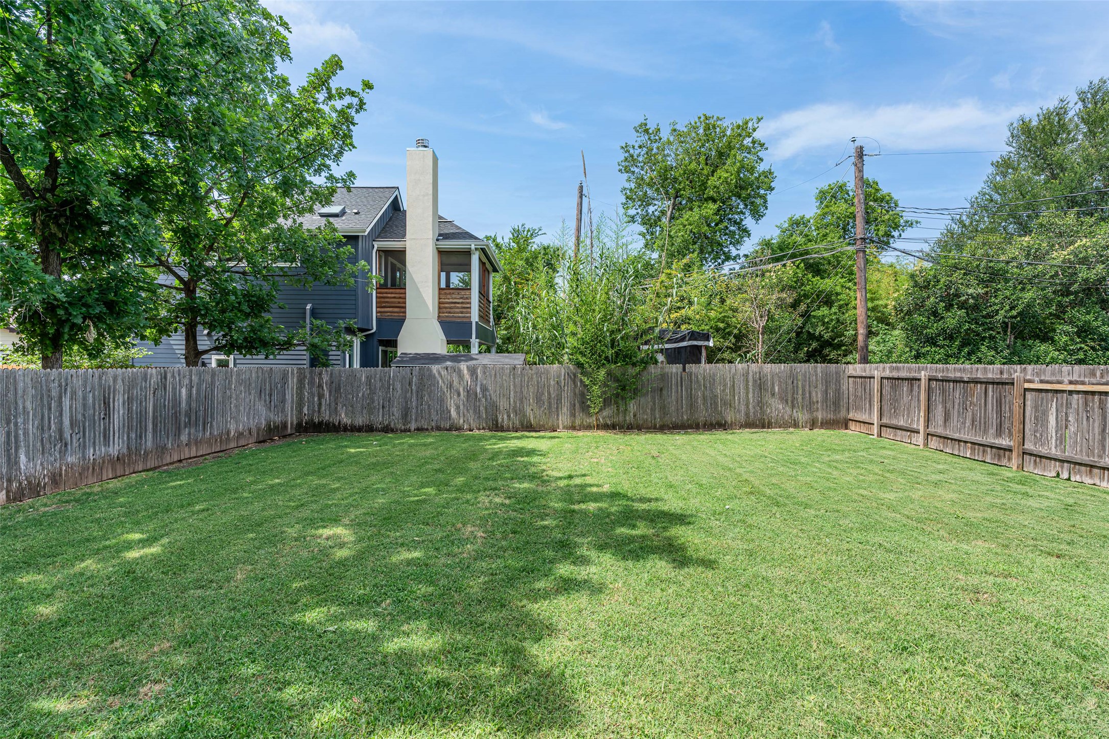 705 East 49th Street, Unit A Austin, TX 78751 - Photo 30 of 40 a fire hydrant in the middle of a yard