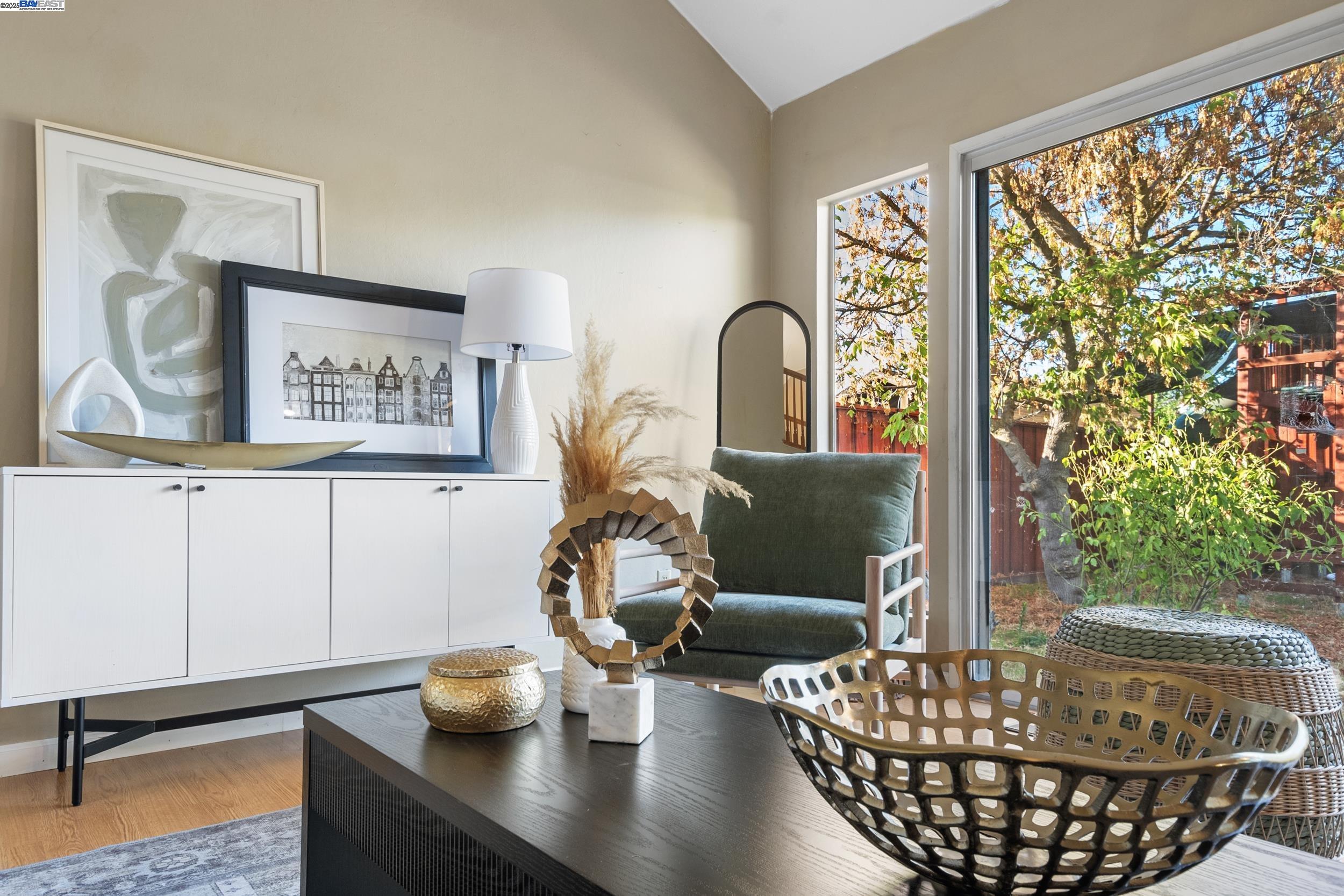 628 Lido Drive Livermore, CA 94550 - Photo 7 of 13 a living room with furniture and a potted plant