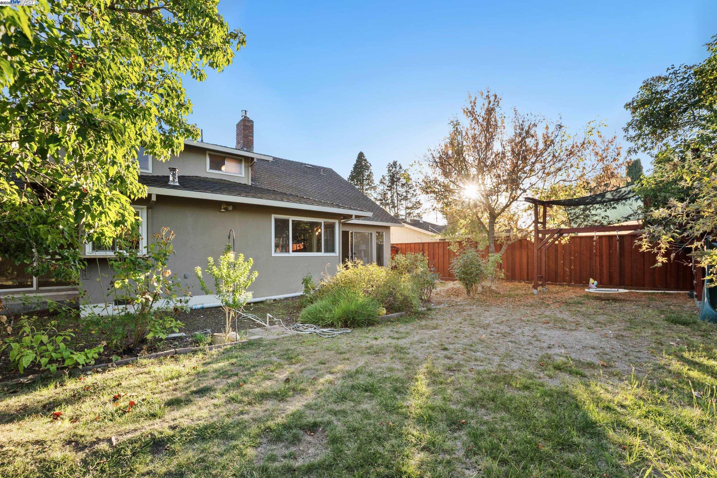 628 Lido Drive Livermore, CA 94550 - Photo 10 of 13 a front view of a house with garden