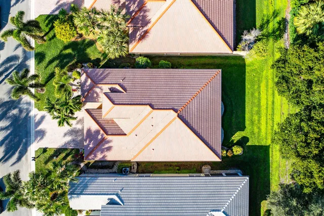 a backyard of a house with lots of green space