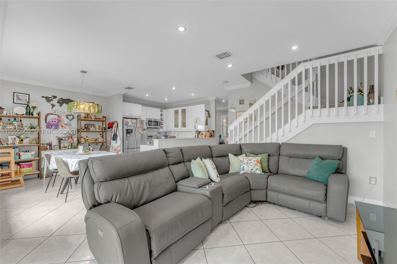 945 Southwest 154th Court Miami, FL 33194 - Photo 11 of 49 a living room with furniture and a wooden floor