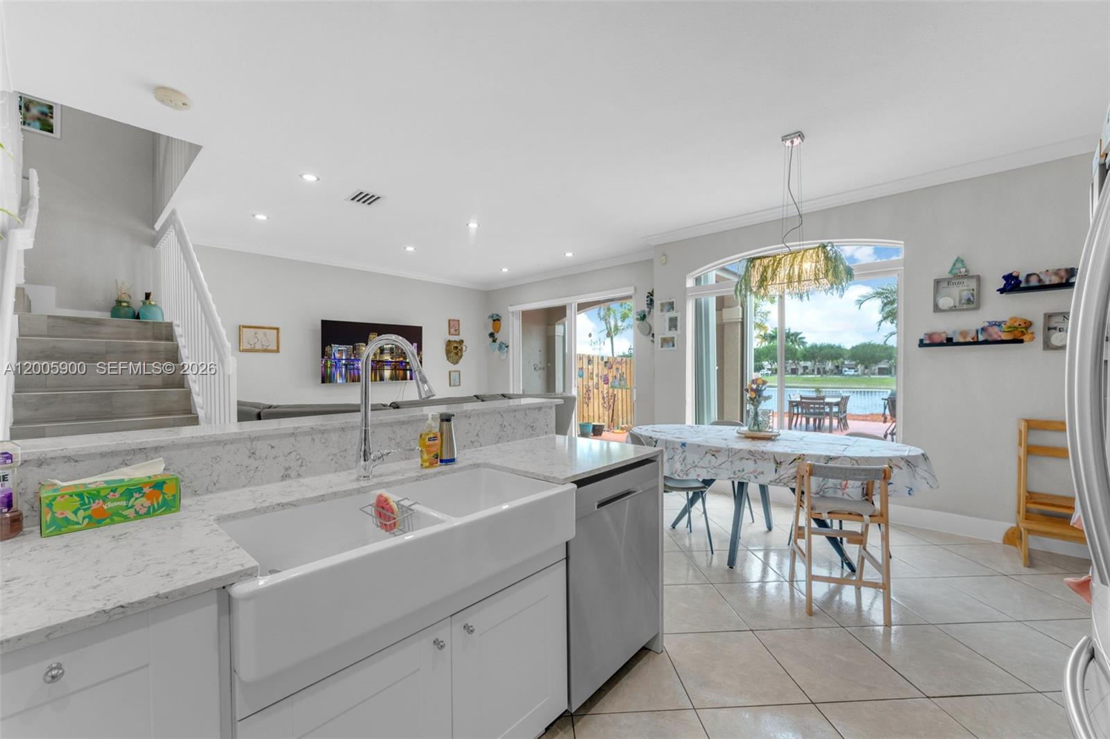 945 Southwest 154th Court Miami, FL 33194 - Photo 15 of 49 a very nice looking dining room with a large window
