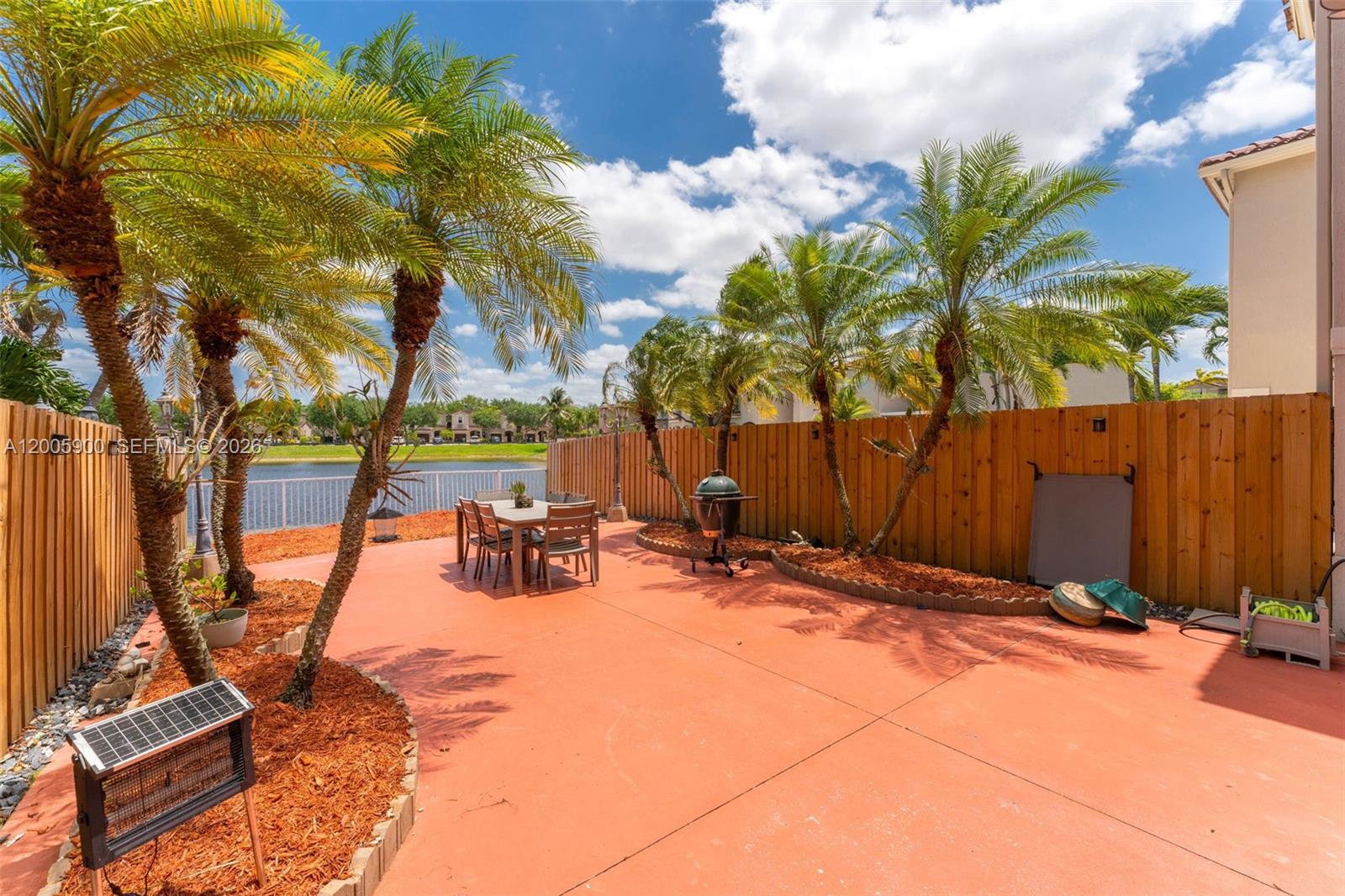 945 Southwest 154th Court Miami, FL 33194 - Photo 29 of 49 a view of outdoor space with seating area