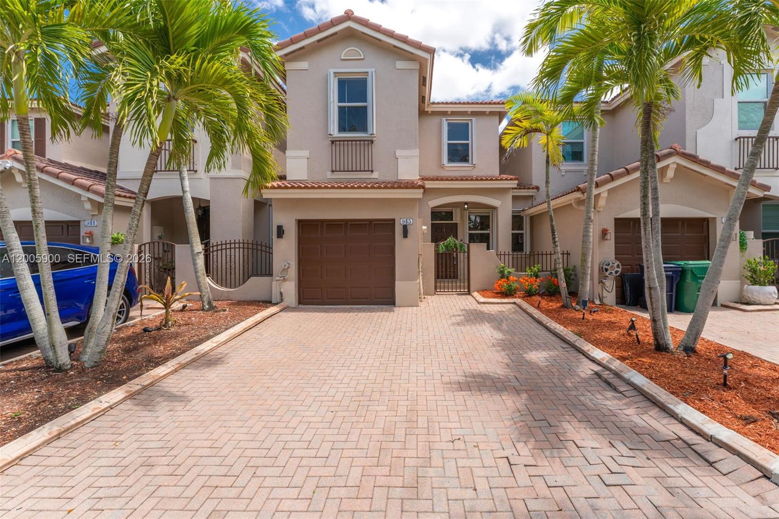 945 Southwest 154th Court Miami, FL 33194 - Photo 4 of 49 a view of a house with backyard porch and sitting area