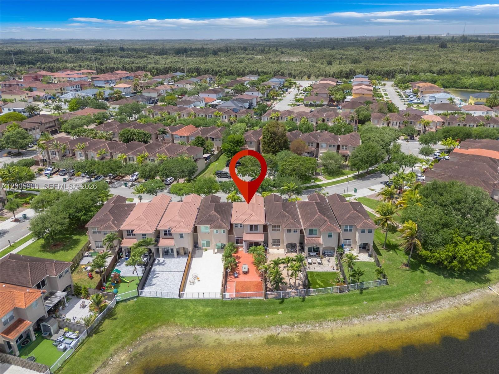 945 Southwest 154th Court Miami, FL 33194 - Photo 41 of 49 an aerial view of residential houses with outdoor space and swimming pool