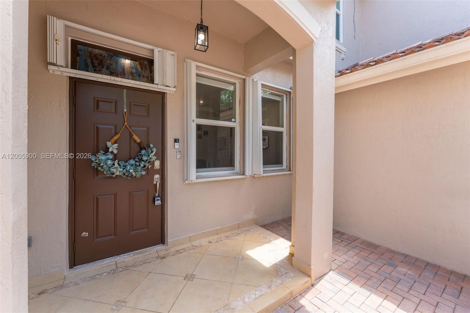 945 Southwest 154th Court Miami, FL 33194 - Photo 5 of 49 a view of a hallway with closet and a window