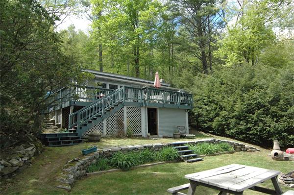 52 Spa Road Phillipston, MA 01331 - Photo 17 of 22 a view of a house with backyard and sitting area