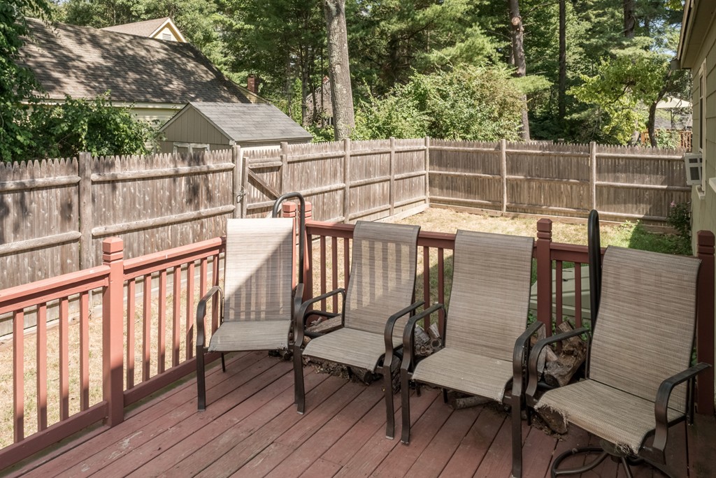 8 May Street Sharon, MA 02067 - Photo 8 of 8 a view of a chairs and table on the wooden floor