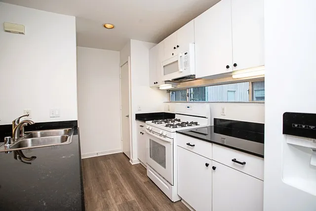 a bathroom with a toilet and a sink