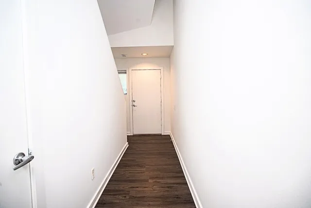 a view of a building with a yard