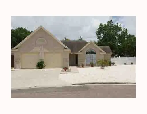 a black and white photo of a house