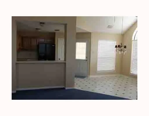 a black and white photo of a living room
