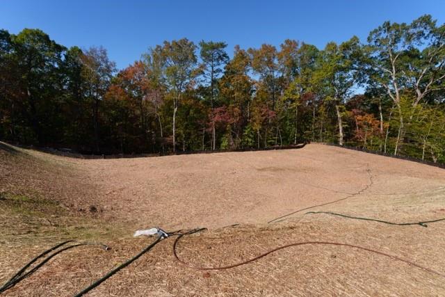 1945 West Paces Ferry Road Northwest Atlanta, GA 30327 - Photo 5 of 16 a view of wooden fence and trees