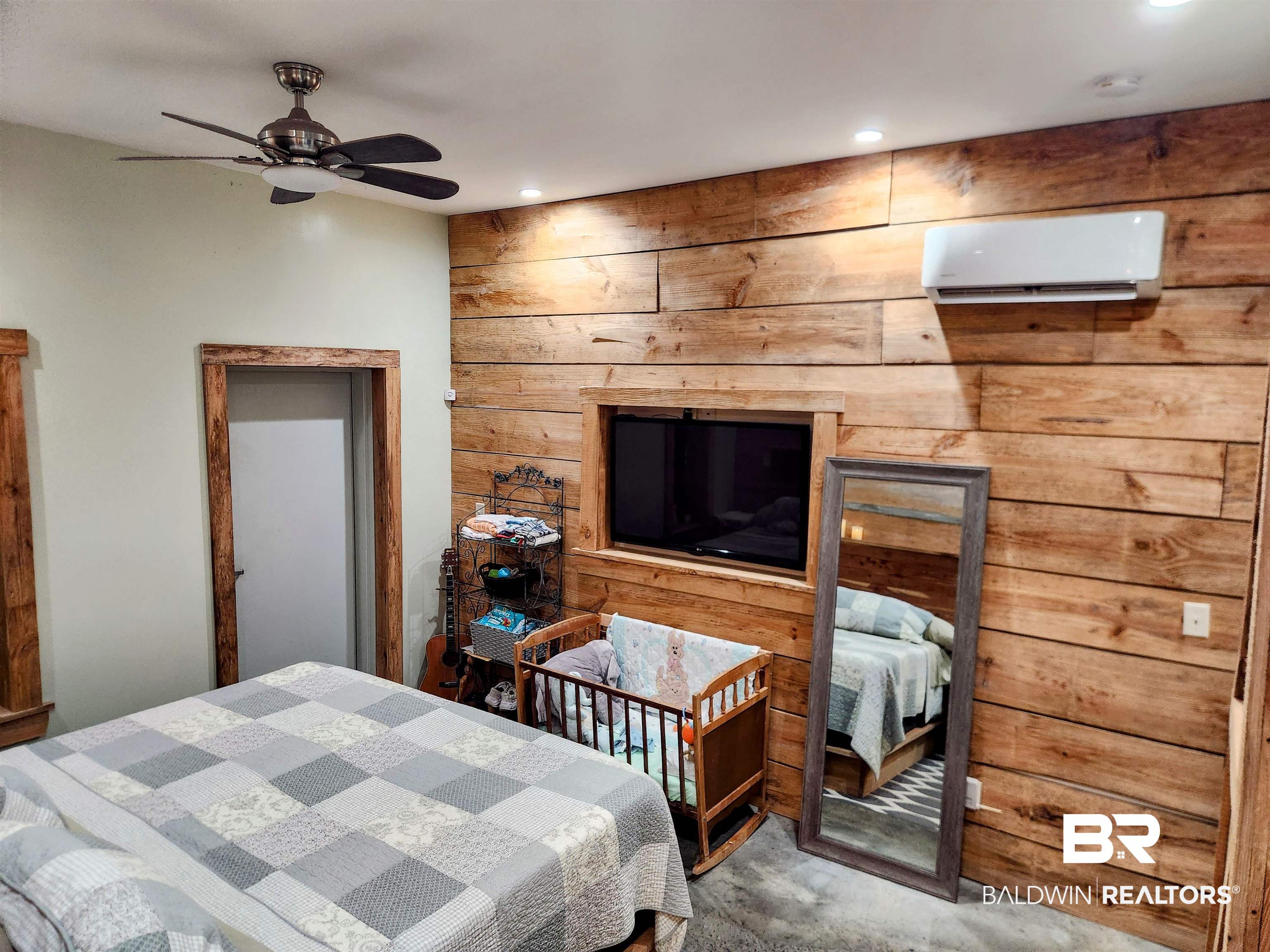 15461 Highway 98 Foley, AL 36535 - Photo 10 of 28 Bedroom featuring a wall mounted AC, wood walls, carpet floors, and recessed lighting