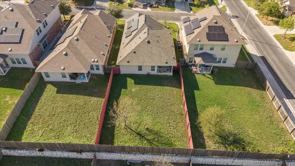 an aerial view of a house with a garden