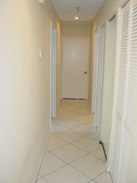 20970 Woodspring Avenue Boca Raton, FL 33428 - Photo 7 of 15 Hallway to Bedrooms