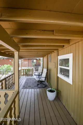 a view of roof deck with patio