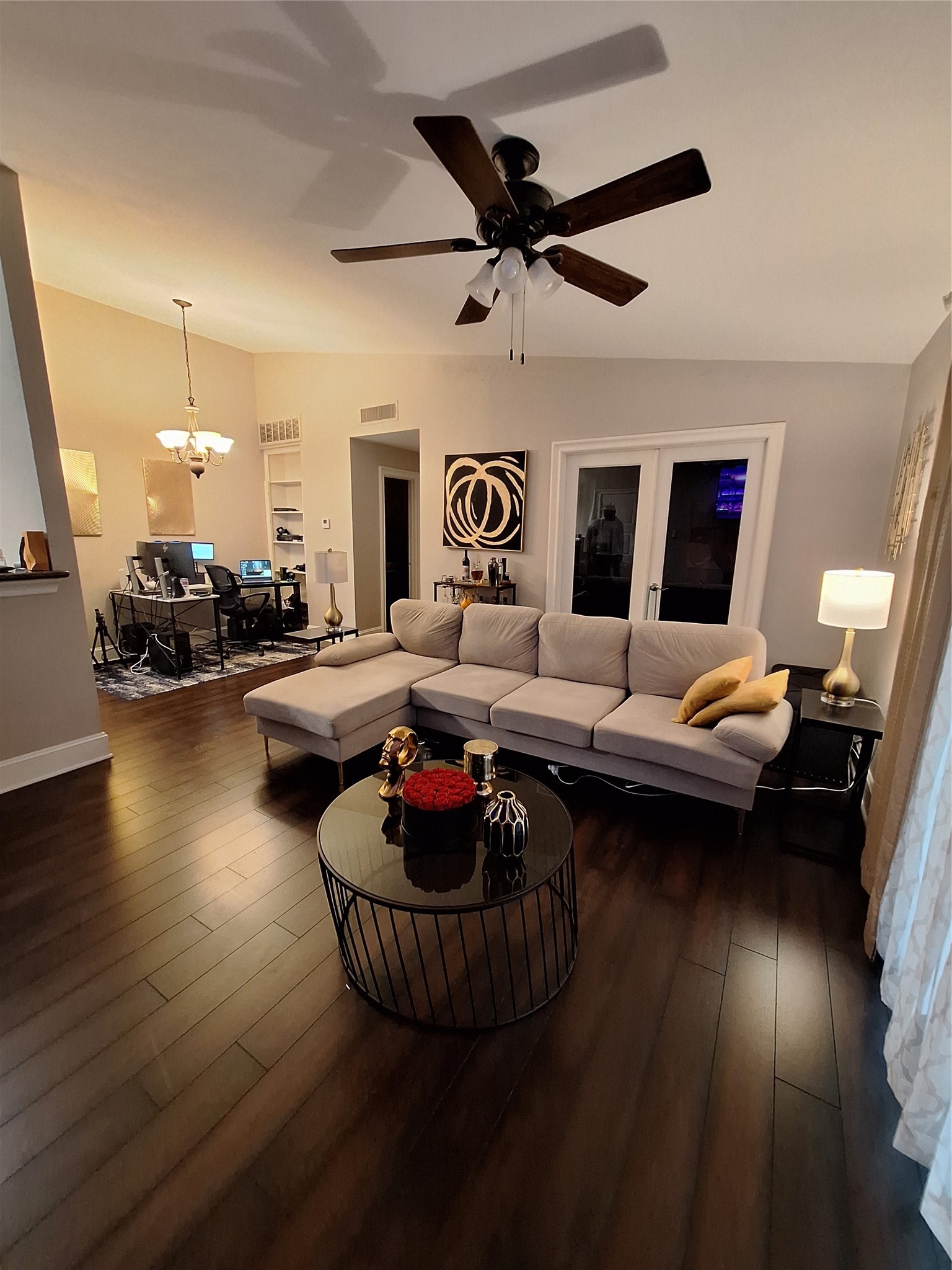 2425 Augusta Drive, Unit 4 Houston, TX 77057 - Photo 2 of 12 a living room with furniture and a wooden floor